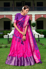 Load image into Gallery viewer, Royal Purple Dola Silk Lehenga with Bandhej blouse , Elegant Purple Shibori Lehenga with tassel dupatta , Zari weaving Purple Lehenga for weddings and festivals , Deep Purple lehenga in soft Dola Silk fabric , Designer Purple lehenga with traditional print . 
