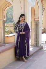 Load image into Gallery viewer, Purple Color Faux Blooming &amp; Viscose Dyable Jacquard Anarkali WIth Price and Best Choise Online Shopping Price Under 2000 . this Fabric Stylish frill-stitched gown with 12-meter flair, cotton lining, and a fancy round neck. Includes a 2.3-meter sequins embroidered cut-work dupatta in six gorgeous shades . This Gown with Sequins Embroidery &amp; Cut-Work Dupatta . Traditionally Look For Anarkali 2025 . 
