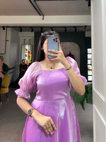 Load image into Gallery viewer, This stitched frock is crafted from Burberry silk with a plain design. 4 meters of flair. The sleeves measure 12&quot; and it features full micro cotton lining for added comfort.

