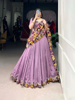 Load image into Gallery viewer, Purple Vichitra Silk lehenga with embroidery , Kalamkari border lehenga in purple color , Purple lehenga choli set for wedding , Designer purple lehenga with dupatta , Purple lehenga for festive occasion , Elegant purple silk lehenga , Purple color lehenga with can-can , Heavy embroidered lehenga in purple , Purple ethnic wear for girls , Purple traditional lehenga with tassels . 
