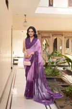 Load image into Gallery viewer, Purple floral marble saree with lace details , Lightweight purple saree for elegant looks , Printed purple saree with Party Wear , Purple saree for festive wear and functions , Soft and weightless purple print saree , Designer purple saree with floral Print , Stylish purple saree with contrast border , Everyday wear purple saree in marble fabric , 
Purple saree for casual ethnic .
