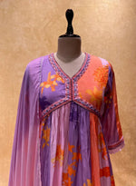 Load image into Gallery viewer, Elegant purple muslin Anarkali with digital shine print , Purple embroidered Anarkali gown with dupatta , V-neck purple Anarkali suit with full sleeves , Designer purple Anarkali with embroidery work , Premium muslin Anarkali in purple with shine print , Purple festive wear Anarkali with dupatta set , Traditional purple muslin Anarkali gown for women . 
