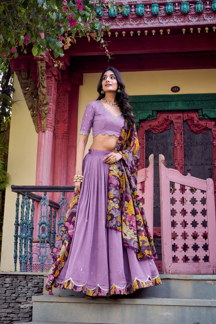 Ethnic Purple Lehenga for Women , 
Purple Silk Lehenga with Tassels & Zip , Purple Lehenga Choli with Kalamkari Dupatta , Elegant Purple Embroidery Lehenga Online , Traditional Purple Lehenga Set for Wedding , Purple Bridal Lehenga with Heavy Flair . 