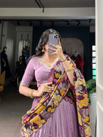 Load image into Gallery viewer, Upgrade your wardrobe with this high-quality, designer half-saree set. Made from luxurious Vichitra Silk, the Lehenga features stunning sequins and thread embroidery work with a striking Kalamkari print border. The complementary Tussar Silk Dupatta adds an elegant touch with its Kalamkari print and foil work, complete with a delicate scallop border. With 4 meters of luxurious flair, the Lehenga is sure to make a statement
