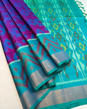 Luxurious Dolla Silk Saree featuring traditional zari weaving. 6.3m length with matching blouse piece. Machine washable for convenient care. Exquisite craftsmanship for sophisticated occasions.

