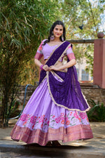 Load image into Gallery viewer, Purple Cotton Silk Dhavani Set , Langa Voni , Half-Saree and Davani Set Price and Online Shopping Price Under 2500 . Shop a stunning Cotton Silk Embroidered Lehenga Set featuring intricate thread embroidery, zari weaving blouse, and a georgette dupatta with sequins work. Perfect for weddings and festive occasions. Fully stitched lehenga with adjustable waist and micro cotton lining for ultimate comfort. 
