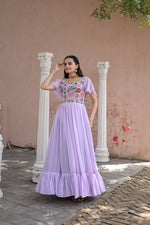 Load image into Gallery viewer, Purple Faux Georgette Gowns With Price and Online Shopping Price Under 1500 . this Fabric So Heavy and Smooth Fabric and Working For Sequins Multithreaded Embroidered work , this Fabric Top Side Fully Embroidery Work , This Fabric Purple Faux Georgette Gown Best For Weddings Wear Collection , Traditional Look For 2024-25 , 2025-26 . 
