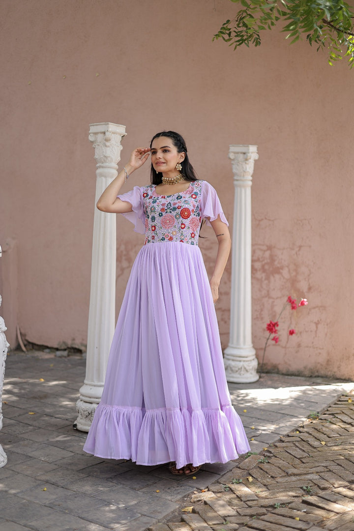 Purple Faux Georgette Gowns With Price and Online Shopping Price Under 1500 . this Fabric So Heavy and Smooth Fabric and Working For Sequins Multithreaded Embroidered work , this Fabric Top Side Fully Embroidery Work , This Fabric Purple Faux Georgette Gown Best For Weddings Wear Collection , Traditional Look For 2024-25 , 2025-26 . 