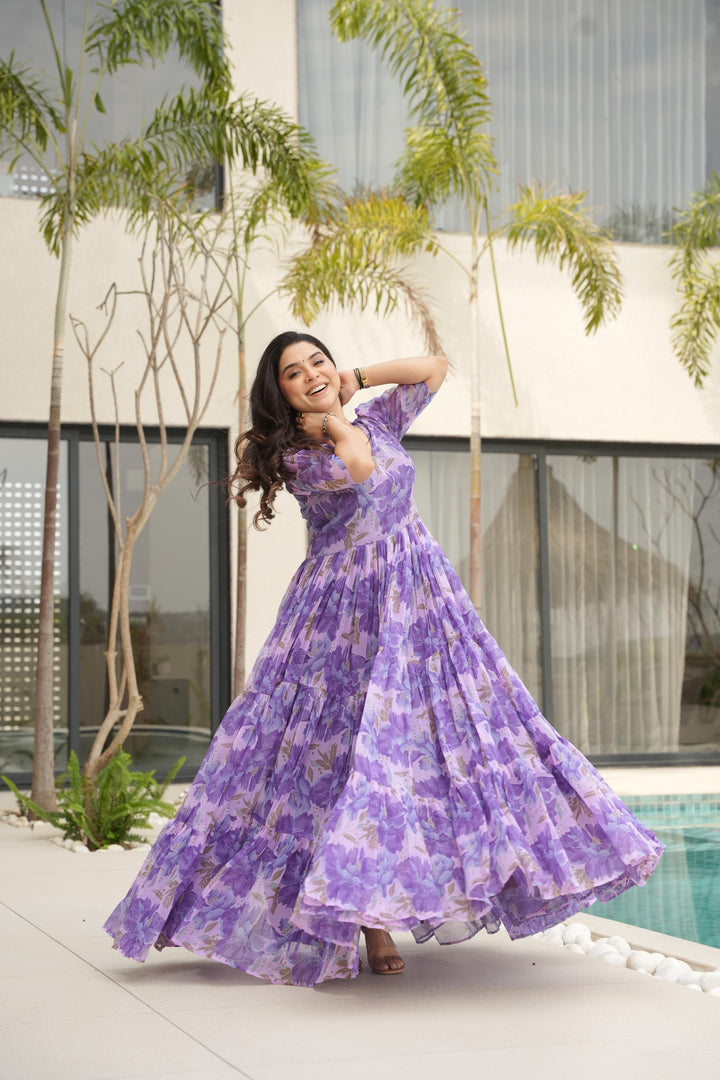 Purple Color Heavy Faux Georgette Gowns Price and Online Shopping Price Under 1499 , Purple Gown Full Inner Top To Bottom Side and Sleeves Half-Sleeves , Fancy V Nack Gown . this Gown 56" inch length fully Flair gown , Purple Printed Work Gown Price 1499 . 
