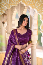 Load image into Gallery viewer, Purple Color Tussar Silk Dhavani Set | Half-Saree . Premium purple lehenga with ikkat prints and foil touch-up , Purple tussar silk lehenga with ikkat foil print for weddings , Designer purple lehenga with foil work and embroidered dupatta , Elegant purple silk lehenga choli .
