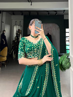 Load image into Gallery viewer, Rama shade lehenga with blouse and dupatta , Partywear rama color lehenga choli , Georgette embroidered lehenga in rama green , Rama color lehenga for festive functions , Elegant rama green lehenga set , Trending rama color lehenga for women , Rama lehenga choli with cancan flair .
