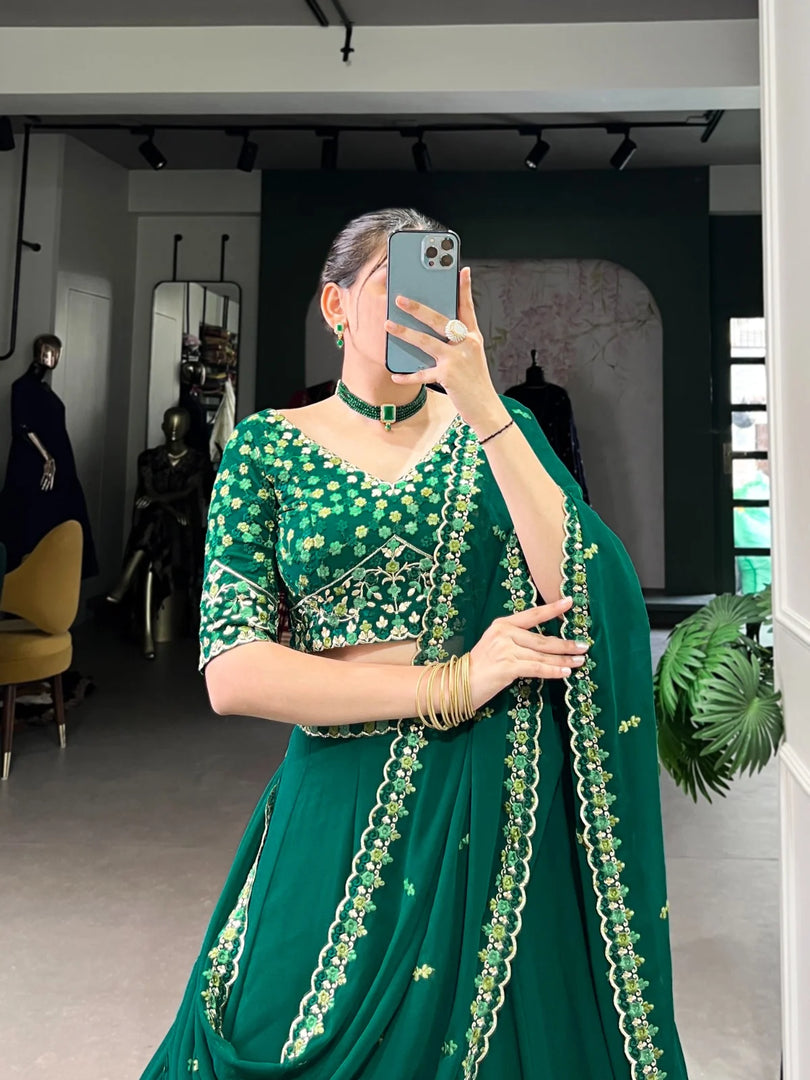 Rama shade lehenga with blouse and dupatta , Partywear rama color lehenga choli , Georgette embroidered lehenga in rama green , Rama color lehenga for festive functions , Elegant rama green lehenga set , Trending rama color lehenga for women , Rama lehenga choli with cancan flair .