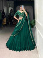 Load image into Gallery viewer, This set includes a stitched Georgette Lehenga with thread embroidery work . It also comes with a stitched blouse made of Georgette fabric with thread embroidery work ,  Georgette Dupatta, measuring 2.40 meters in length, also features thread embroidery work. Along with a drawstring and zip closure, this package contains everything you need for a complete look.

