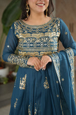 Load image into Gallery viewer, Festive special Rama green silk lehenga with blouse , Trending Rama color gown for receptions and haldi ceremonies , Rama color ethnic wear with heavy embroidery and lace , Glamorous Rama gown for wedding guests and bridesmaids . 
