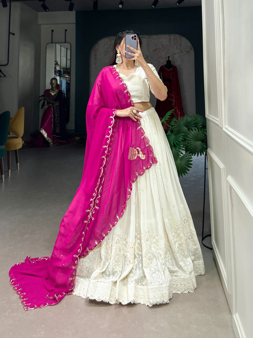 White georgette lehenga with Lucknowi paper mirror detailing , Bridal white stitched lehenga with cancan and canvas , Elegant white lehenga for mehendi, haldi, and receptions , Mirror work white lehenga with sequins embroidered dupatta , Soft white color lehenga with thread and mirror highlights , Designer white Lucknowi lehenga set with classic blouse.