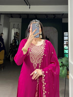 Load image into Gallery viewer, Rani pink organza kurti set with dupatta , Embroidered rani pink kurti with matching pants , Elegant rani pink ethnic set with lace detailing , Rani pink sequin kurti for festive occasions , Designer organza kurti in rani pink shade , Rani pink kurta set with broidered dupatta , Stylish rani pink partywear kurti set , Lightweight organza rani pink salwar suit , Rani pink stitched kurti with organza dupatta .
