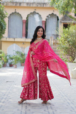 Load image into Gallery viewer, Rani Pink Color Viscose Georgette Jacquard Kurti With Dupatta , Ghaghara and Dupatta Online Price 2499 . Rani Pink Wedding Wear Dress , Rani Pink Kurti with Gharara , Stunning Rani Pink Festive Outfit , Traditional Pink Gharara Set . 
