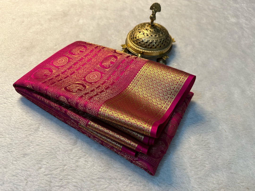 Premium Mysore Silk Saree with zari weaving. Includes matching blouse piece. 6.3m length. Machine washable. Model wears famous  saree - Traditional Festival south saree . 
