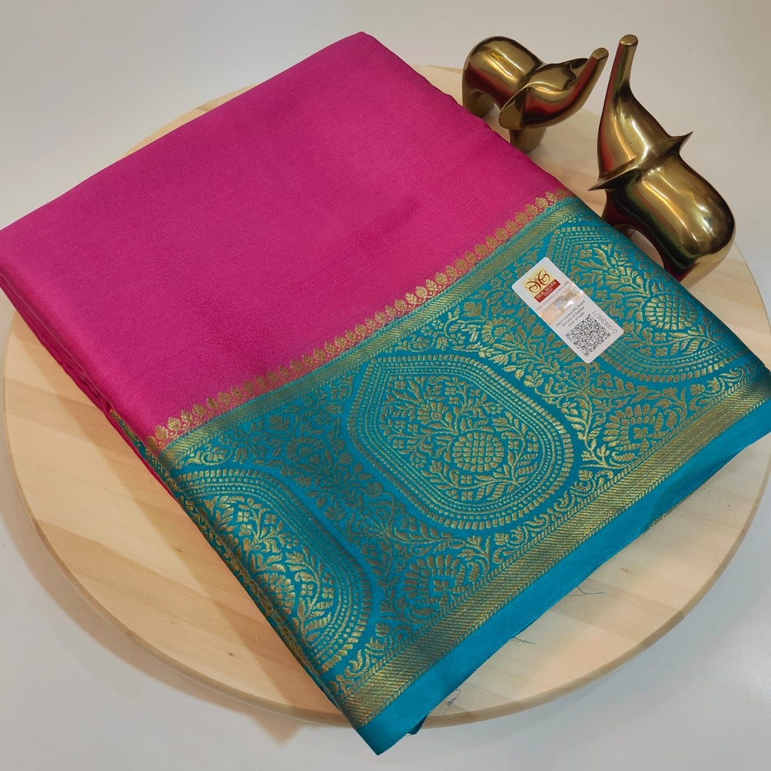 Elegant Semi-Mysore Silk Saree featuring zari weaving. 6.3m length with matching blouse piece. Machine washable. Size S shown on model.
