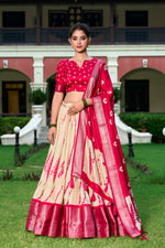 Load image into Gallery viewer, Buy Rani Pink silk lehenga with zari weaving border online , Gorgeous Rani Pink ethnic lehenga with dupatta set , Rani Pink bridal lehenga in soft Dola Silk , Trending Rani Pink Lehenga for Indian weddings , Rani Pink Dola Silk Lehenga with rich ethnic vibes.
