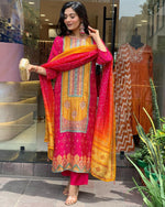 Load image into Gallery viewer, Rani Satin Kurti WIth Price and Best For Wedding ThIs Kurti price Under 1500 . this Fabric Satin Rani Color Stone Work this Kurti . this Fabric Multi Color Dupatta and Rani Pent This include Fabric Rich Border With Zari Weaving Work and Stone Work . This Popular Best Selling and Most Famous Fabric and Round  Necks .Traditional Look 2024-25 . 

