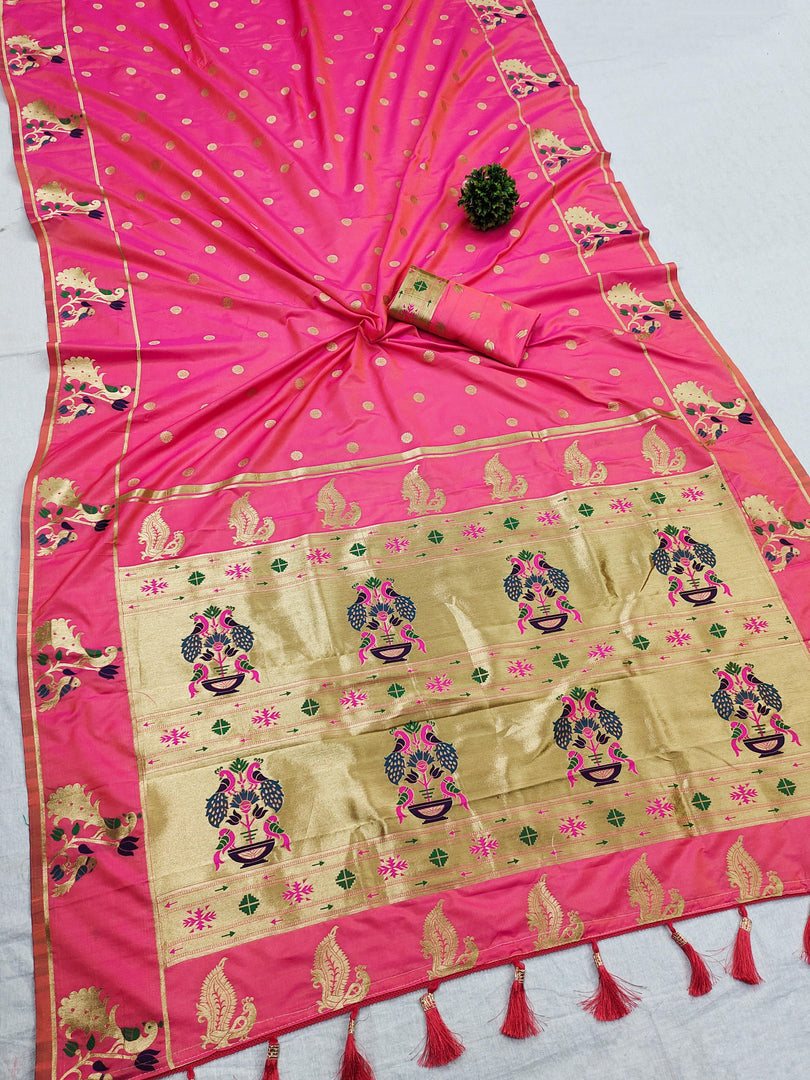 Explore our stunning Rani Soft Paithani Silk Saree, crafted from premium Soft Paithani Silk fabric for a luxurious feel. Perfect for weddings, parties, and special occasions, this saree offers unmatched elegance, vibrant color, and a soft, smooth drape.
