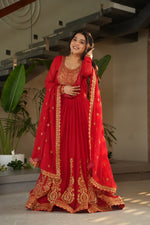 Load image into Gallery viewer, Red embroidered gown with dupatta , Faux blooming red gown with zari sequins , Bridal red gown for festive occasions , Elegant red gown with lace dupatta , Full sleeve red party wear gown , Red designer gown for weddings , Red gown with cotton lining and embroidery , Red round neck gown for ethnic events , Stylish red floor-length gown for women .

