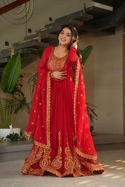 Red embroidered gown with dupatta , Faux blooming red gown with zari sequins , Bridal red gown for festive occasions , Elegant red gown with lace dupatta , Full sleeve red party wear gown , Red designer gown for weddings , Red gown with cotton lining and embroidery , Red round neck gown for ethnic events , Stylish red floor-length gown for women .