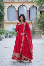 Load image into Gallery viewer, Red Color Faux Blooming Anarkali With Price and Online Shopping Price Under 2000 . Step into elegance with this Faux Blooming  and Dupatta set. Featuring intricate sequins embroidery, a padded design, and four rich shades Red color For Weddings Wear Collection . Traditional Look For 2024-25 , 2025-26 . 
