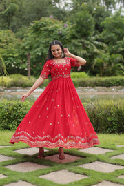 Red Color Faux Blooming Gown With Price and Best Wedding Collection Price Under 1500 .this Fabric Grace your events with this stunning Faux Blooming Gown. Highlighting intricate zari-sequins embroidery, a square neck, and a 3.5-meter flair, it offers unmatched style and comfort 