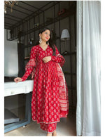 Load image into Gallery viewer, Red Color Pure Cotton Anarkali With Price and online Shopping price under 1500 . This Fabric  Elegant Anarkali set made from pure cotton, featuring hand prints, matching pants, and a dupatta. Comfortable and stylish with a 48-inch length. Easy machine wash.
