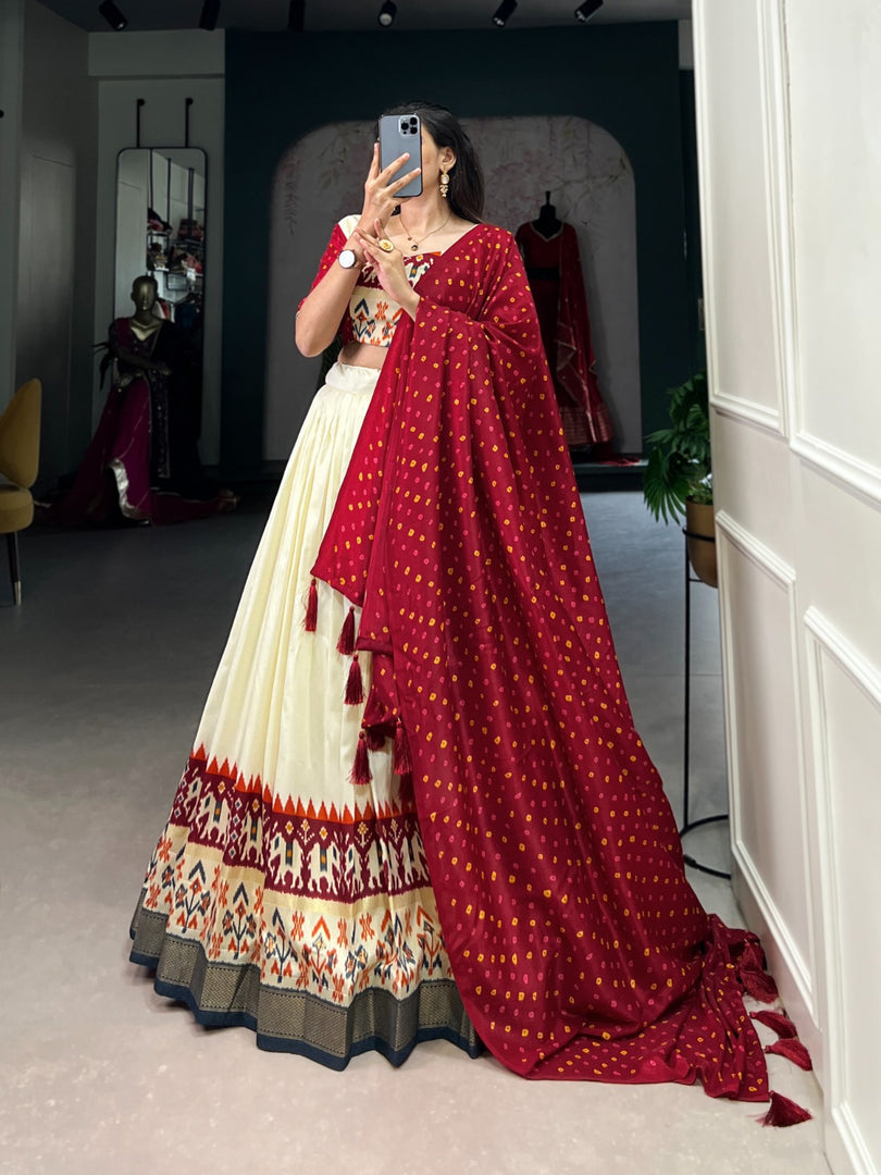 Red Color Tussar Silk Dhavani Set , Langa Voni , Davani Set and Half-Saree s With Price and Online Shopping Price Under 2000 . this Fabric So Heavy and Premium Rich Border . This Fabric Lehenga Work Patola Print With foil Print and Blouse Stitched and Work For Bandhej with patola Print and Foil Work and Dupatta Work Patola And Foil Printed With Both Side Tassels , Traditional Look For 2024-25 , 2025-26 . 
