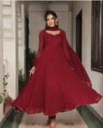 Load image into Gallery viewer, Stylish red ethnic gown with sweetheart neck , Red embroidered Anarkali for wedding functions, Red georgette long dress for traditional look , Premium red Anarkali with full sleeves and dupatta , Red Anarkali gown with heavy embroidered detailing .
