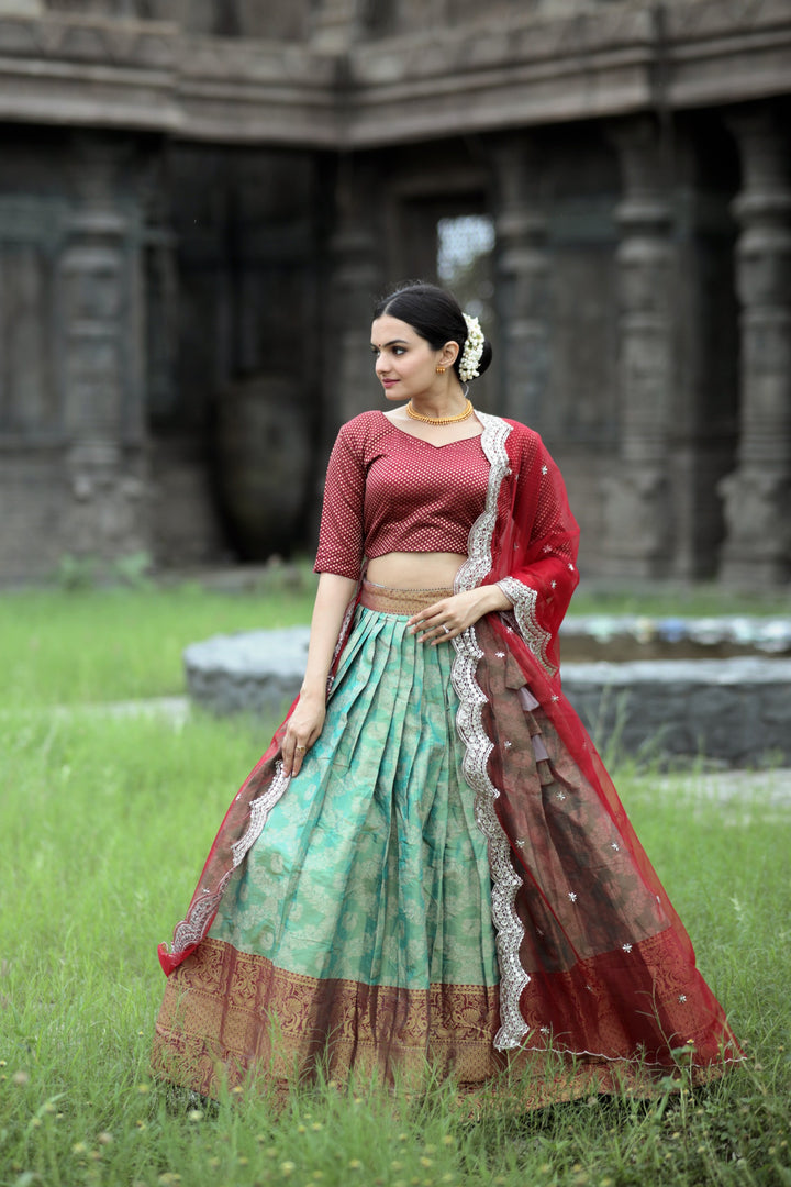 Red Kanjivaram Pattu Davani Set and Dhavani Set , Langa Voni With Price Under 1500 . This Fabric Lahenga Kanjivaram pattu silk lehenga with Zari  Weaving Work
. this fabric Blouse Same as ZAri Weaving Work . Fully Zari Weaving Work . 