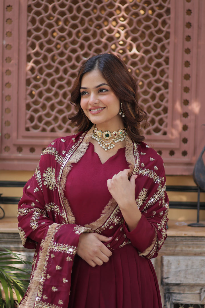 Designer embroidered gown with dupatta , Party wear georgette gown for women , Fancy V-neck full sleeve gown , Zari and sequins gown for festive occasions
Elegant Indian gown set with lace dupatta . 