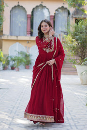 Red Or Maroon Color With Embroidery Faux Blooming Georgette Gown With Price and Online Shopping Price Under 2000 . Step into style with this Maroon Or Red Gown in Faux Blooming Georgette. Featuring heavy Rich Sequins Embroidered work
, a stitched can-can design, and a Faux Blooming Georgette With Attractive lace and embroidered work, it’s ideal for weddings and celebrations . 