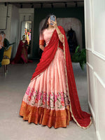Load image into Gallery viewer, This half saree features a cotton silk lehenga with thread embroidery work, a georgette dupatta with sequins embroidery and lase border, and a cotton silk blouse with thread embroidery and zari weaving work.

