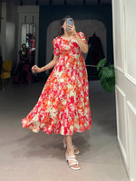 Load image into Gallery viewer, Red Rayon Printed With Foil Work
Dresses Price and Under 1000 . Step out in style with this stitched Rayon frock featuring a floral print design, 47-inch length, and comfortable micro cotton lining.
