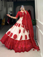 Load image into Gallery viewer, Red Tussar Silk Dhavani Set , Langa Voni and Davani Set WIth Price and Online Shopping Price Under 2000 . Floral luxury with this Tussar Silk Lehenga Set. Stitched lehenga with can-can, micro cotton lining, unstitched blouse, and a tassel-adorned dupatta make it the perfect festive wear . 
