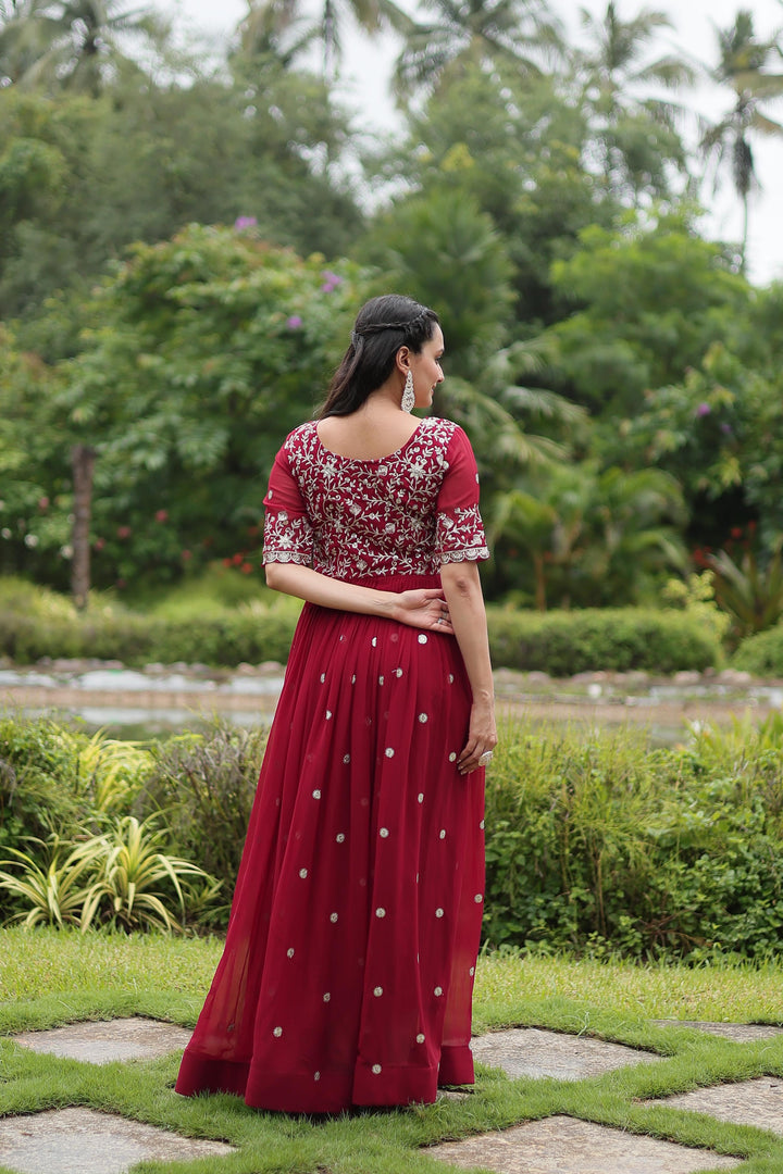 Embroidered Faux Blooming gown featuring Zari Sequins work. 54-inch length with 3.5-meter flair, full cotton lining, half sleeves, and round neck gown - Shop now Shoppers Trend