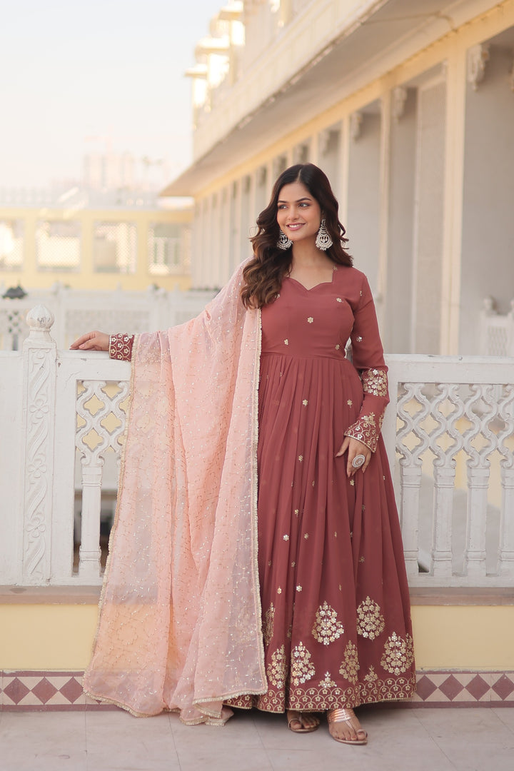 Rose Gold Faux Georgette Anarkali With Price and Online Shopping Price Under 2000 . Zari Thread & Sequins Embroidery and Dupatta Russian Silk With Embroidered Cut-Work . This Fabrice Rose Gold Anarkali Fancy V Neck and Dupatta Sequins Embroidered work with designer lace border , Traditional Look For 2024-25 , 2025-26 . 