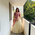 Load image into Gallery viewer, Rose gold tissue silk half saree lehenga , Embroidered rose gold lehenga choli set , South Indian rose gold lehenga with dupatta , 
Rose gold zari tissue silk lehenga for women , Designer rose gold half saree online , Stunning rose gold lehenga with voni , Rose gold lehenga choli for festivals , Elegant rose gold tissue silk lehenga choli , 
Buy rose gold lehenga with blouse and dupatta .
