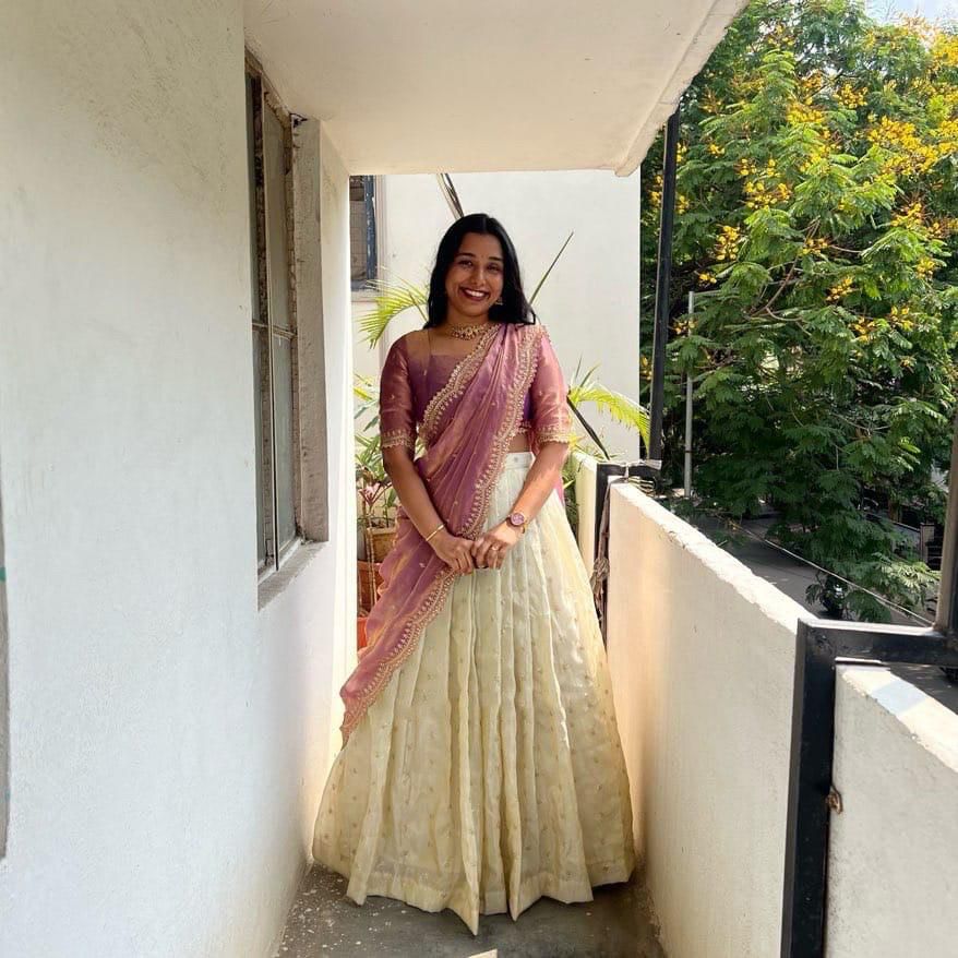 Rose gold tissue silk half saree lehenga , Embroidered rose gold lehenga choli set , South Indian rose gold lehenga with dupatta , 
Rose gold zari tissue silk lehenga for women , Designer rose gold half saree online , Stunning rose gold lehenga with voni , Rose gold lehenga choli for festivals , Elegant rose gold tissue silk lehenga choli , 
Buy rose gold lehenga with blouse and dupatta .