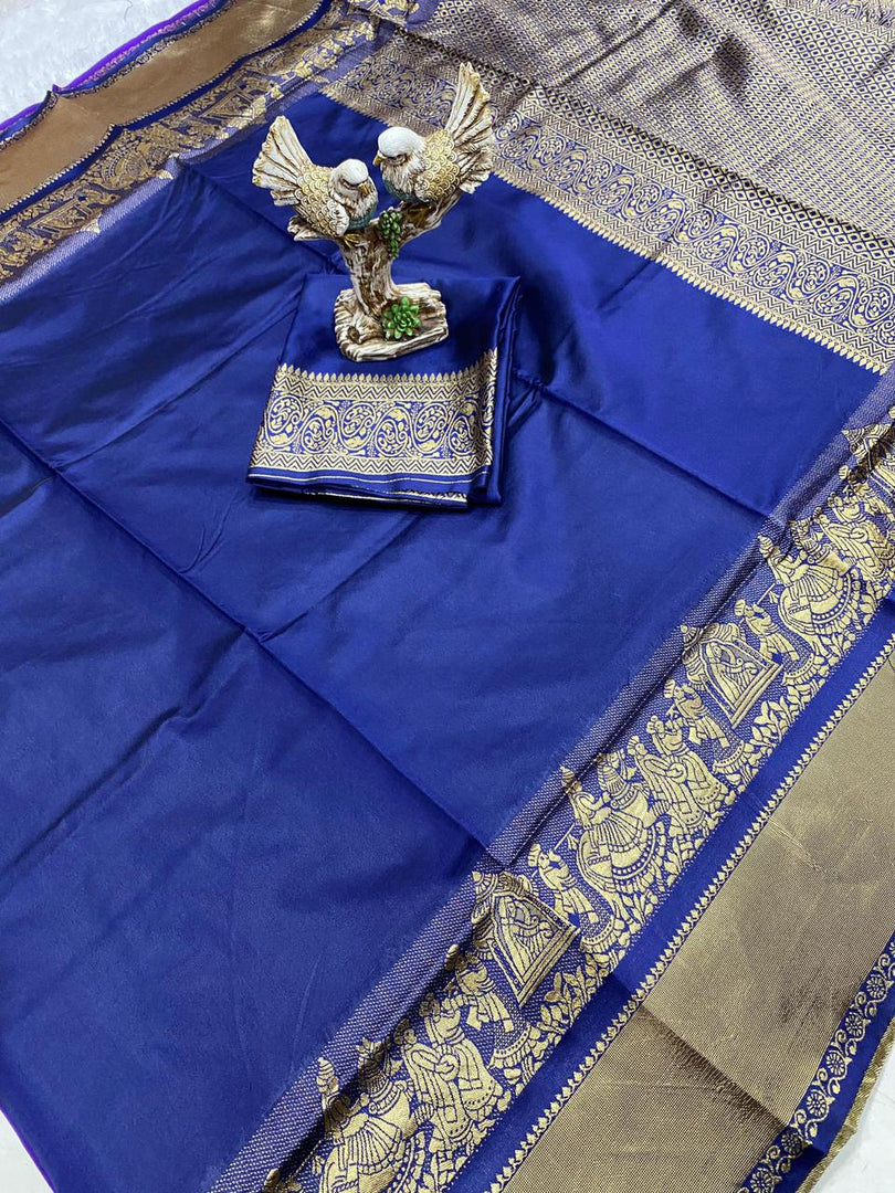 Dark blue soft silk saree with bold jacquard design , Navy blue lichi silk saree for wedding and events , 
Premium dark blue jacquard saree in soft silk fabric , Elegant dark blue saree for classic ethnic wear , Traditional navy lichi silk saree with zari border , Luxurious dark blue saree with soft drape and rich texture , Latest design dark blue lichi silk saree for festive wear .