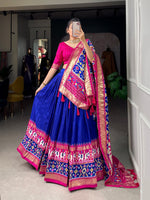 Load image into Gallery viewer, Royal Blue Premium tussar silk dhavani with patola print and foil detailing. Includes stitched lehenga (fits up to 42&quot; waist), unstitched blouse, and decorated dupatta with gotta patti border. Features can-can for enhanced volume and micro cotton lining for comfort.
