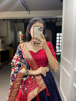 Load image into Gallery viewer, Elegant tussar silk dhavani featuring patola print with foil work. Complete set includes stitched lehenga , unstitched blouse, and decorated dupatta with gotta patti border. Crafted for comfort with premium finishes and traditional detailing with Price Under 2000 - Shop Now - Shoppers Trend

