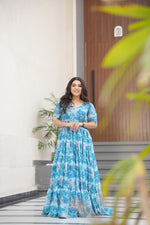 Load image into Gallery viewer, Sky Faux Georgette printed gown with 56-inch length and 12-meter flair. Features half sleeves, fancy V-neck, and full cotton lining. Complete stitched package includes one gown.
