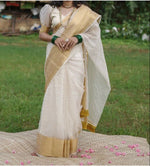 Load image into Gallery viewer, 6.3M soft organza Onam Saree with check pattern and zari border. Features puff half sleeves. Machine washable. Includes one gown piece.
