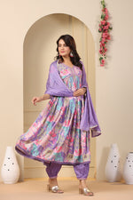 Load image into Gallery viewer, This purple Anarkali set features cotton maslin fabric with digital shine print embroidery. It includes a gown, pant, and dupatta, with a V-neck and full sleeves. The length is 52-55 inches. Easy to care for with machine wash. Available in size S.

