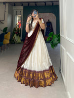 Load image into Gallery viewer, Celebrate Onam in traditional splendor with our exquisite Sandesham Dhavani Set. The lehenga features premium Zari Cotton with elaborate jacquard detailing
